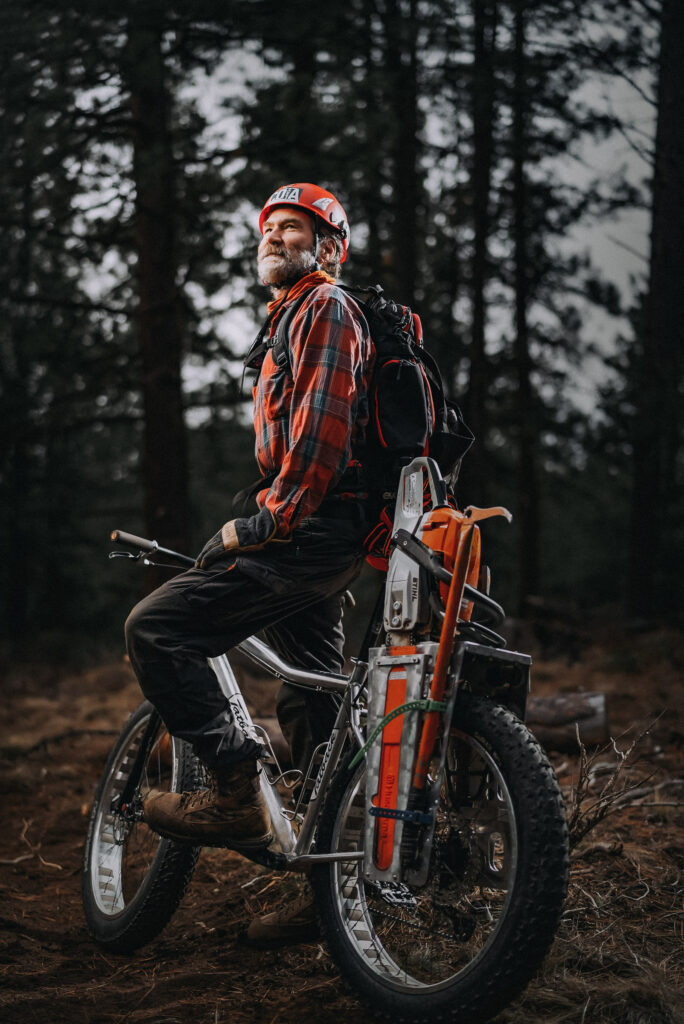 a man seated on a mountain bike