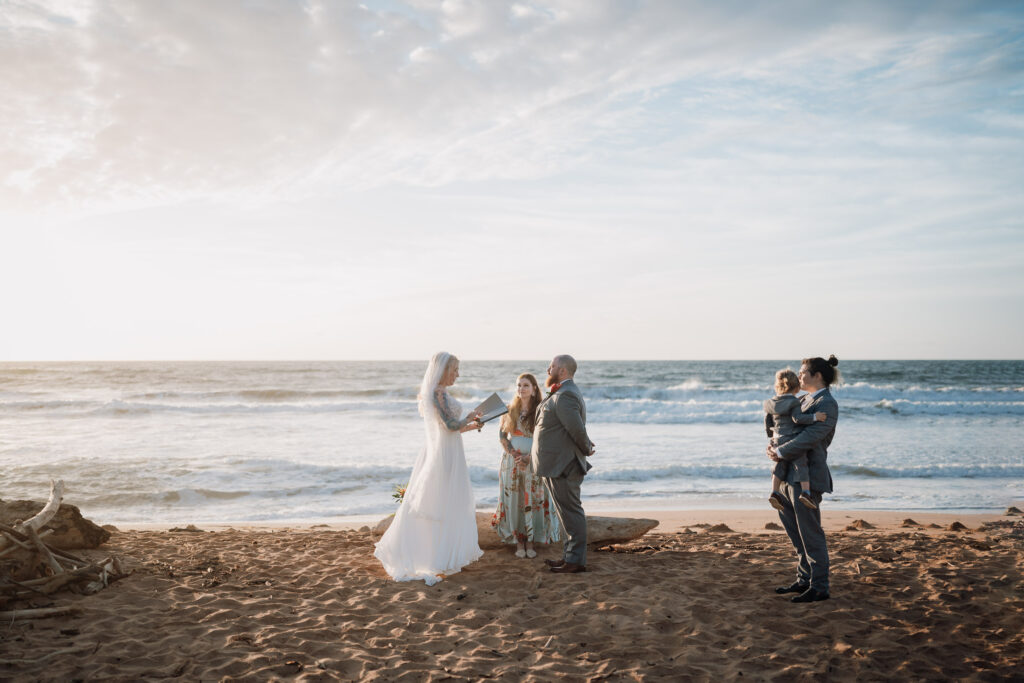 a bride and groom get married on a Kauai beach