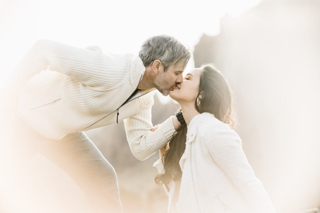 a kiss during an engagement session at Smith Rock