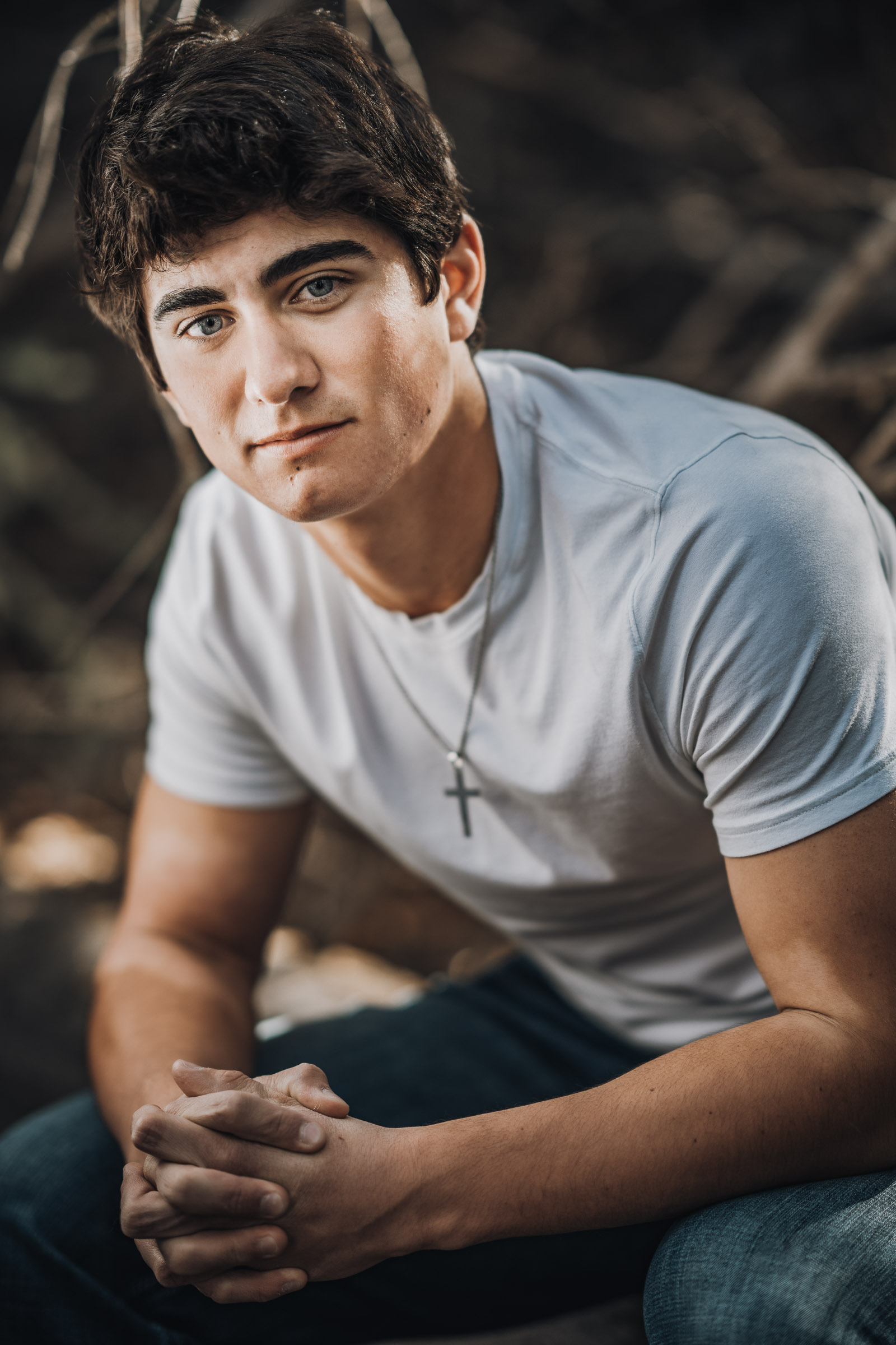 a young man during his senior photo session in Bend oregon