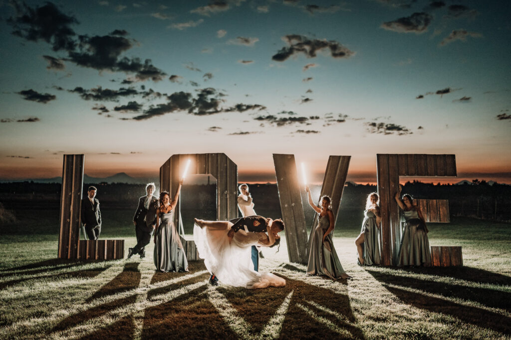 a wedding party photo at night